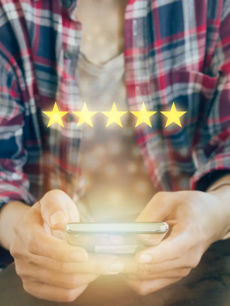 Abstract image depicting a young male sharing 5 star feedback on a mobile device.