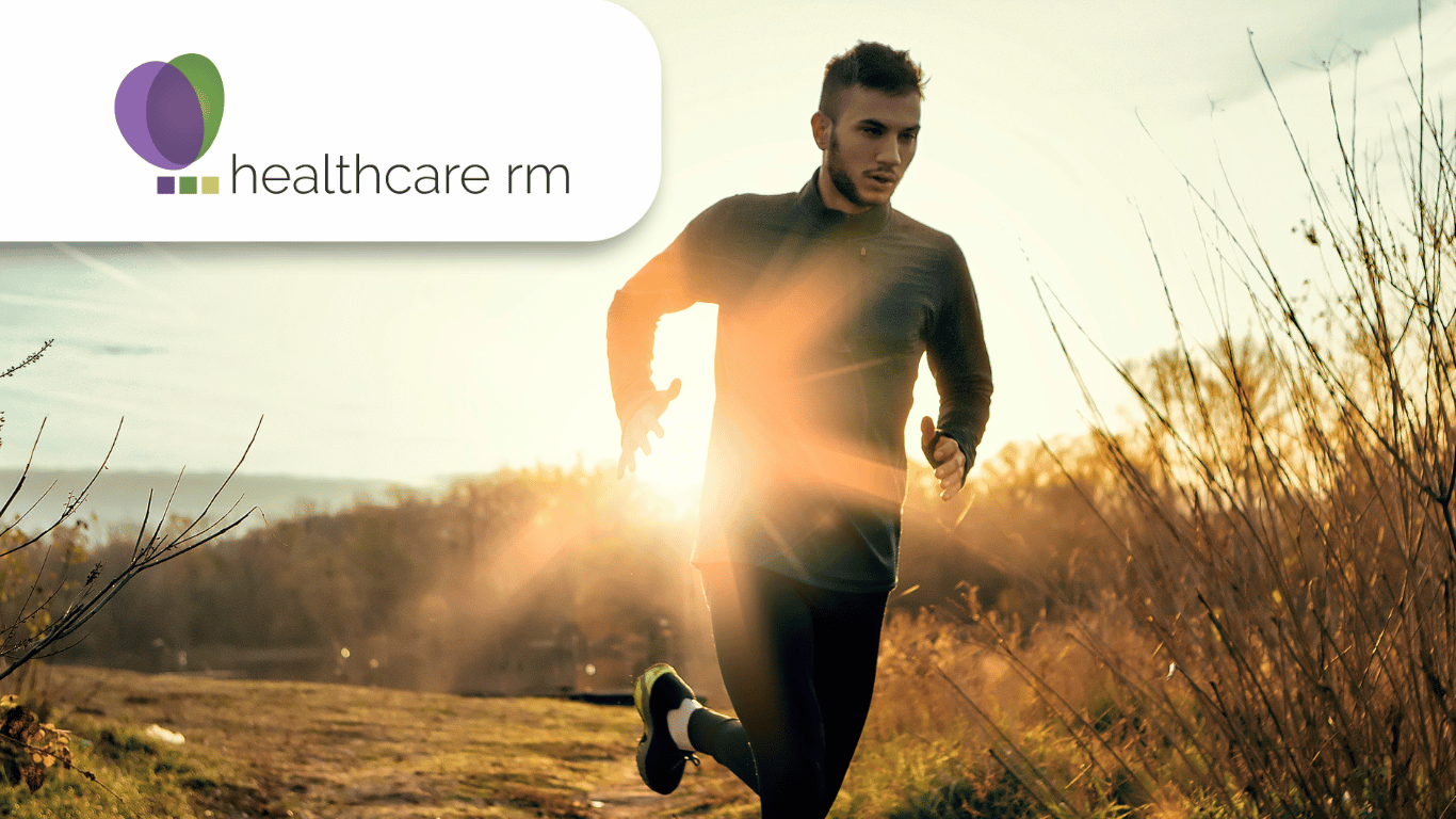 healthcare rm logo and a man jogging in a field