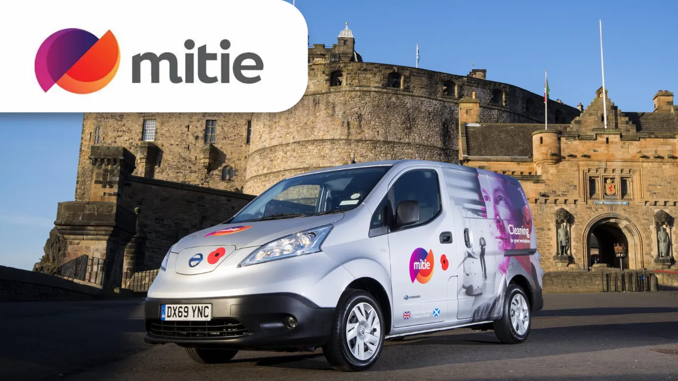 Mitie case study image for Dynamics 365 showing Mite van in front of Edinburgh Castle